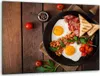 A cooked breakfast is served on a wooden table. Produktbild-Vorschau