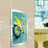 A poster for the Tour de France 2017 is displayed on a wall. Náhľad obrázku produktu