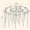 A silver metal grill rack with multiple skewers, shown from a slightly elevated angle. Náhľad obrázku produktu