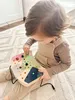 Small Foot - Tableau d'activité LED en bois avec lumière et Voir les images du produit 2