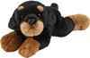 A plush toy dog lying down. Produktbild-Vorschau