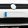 A close-up shot of a car's front grille and license plate holder. Produktbild-Vorschau
