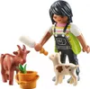 A Playmobil figure feeding a baby goat and a baby cow. Produktbild-Vorschau