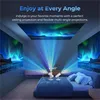 A bedroom scene with projectors casting aurora borealis images onto the walls and ceiling. Produktbild-Vorschau