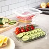 A kitchen counter with food storage containers and ingredients. Produktbild-Vorschau