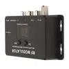 A black RF modulator device with various ports and a digital display, shown from a slightly elevated side angle against a white background. Náhľad obrázku produktu