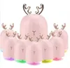A group of pink deer-shaped humidifiers with silver antlers are arranged in front of a white background. Náhled obrázku produktu