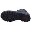 The sole of a black boot is shown against a white background. Produktbild-Vorschau