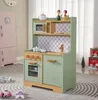 A children's play kitchen set with accessories in a room setting. Podgląd zdjęcia produktu