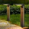 Two solar-powered pathway lights illuminate a stone path in a garden at dusk. Náhľad obrázku produktu