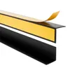 A close-up shot of a black L-shaped profile with yellow adhesive tape. Anteprima dell’immagine prodotto