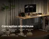 A modern standing desk in a home office setting, with a computer, tablet, and plant. Anteprima dell’immagine prodotto