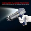 A hand wearing a white glove holds a blue and gold portable car vacuum cleaner with a flashlight function. Produktbild-Vorschau