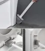 A toilet brush being used to clean a toilet. Náhled obrázku produktu