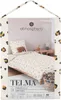 The image shows the packaging of a bedding set with a leopard print. Podgląd zdjęcia produktu