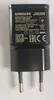 A black Samsung travel adapter is shown against a light gray background. Produktbild-Vorschau