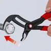 A close-up shot of a pair of pliers gripping a bolt. Anteprima dell’immagine prodotto