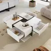 A modern living room setting with a white and black coffee table as the central focus. Produktbild-Vorschau