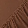 A close-up view of a brown jersey fitted sheet, showing the elasticized edge. Produktbild-Vorschau