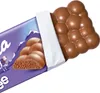 A Milka Luflee chocolate bar, partially unwrapped, showing its bubbly texture. Produktbild-Vorschau
