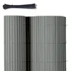 A roll of grey PVC privacy screen and a bundle of black zip ties. Podgląd zdjęcia produktu