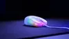 A gaming mouse with RGB lighting sits on a dark surface. Podgląd zdjęcia produktu