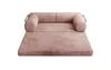 A rose-colored sofa bed is shown from the front, unfolded into a bed. Produktbild-Vorschau