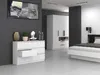 A modern bedroom with a white dresser, a large wardrobe, and a bed. Anteprima dell’immagine prodotto