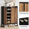 A shoe cabinet with its doors open, displaying shoes on shelves. Inset images highlight the handle and hinges. Produktbild-Vorschau