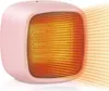 A pink mini electric ceramic heater emitting warm air. Produktbild-Vorschau