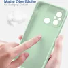 A hand is touching a light green phone case, highlighting its matte surface and soft grip. Produktbild-Vorschau