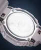 Close-up view of the back of a pink Casio G-Shock watch, showing the metal case back with engraved text and logos. Produktbild-Vorschau
