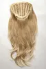 A hairpiece with a blond mix color is laid out on a white background. Produktbild-Vorschau