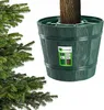 A close-up of a green Christmas tree stand with a tree trunk inside, with a label showing product information. Voir les images du produit
