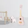 Drewniana gitara dla dzieci - ukulele - kolor różowy Podgląd zdjęcia produktu 10
