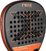 Close-up view of a black and orange padel racket. Podgląd zdjęcia produktu
