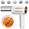 A handheld electric pasta maker with various attachments and a plate of spaghetti. Produktbild-Vorschau