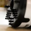 A close-up shot of the brushes on a mini table vacuum cleaner. Anteprima dell’immagine prodotto