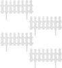 Four white picket fence sections arranged in a grid. Produktbild-Vorschau