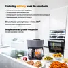 A kitchen counter with a food fryer and prepared food dishes. Podgląd zdjęcia produktu
