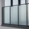 A close-up view of a frosted glass balcony railing. Produktbild-Vorschau