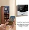 A person is using a smartphone to control a smart thermostat mounted on a wall, with a bookshelf in the background. Podgląd zdjęcia produktu