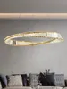 A modern living room with a sofa and a crystal chandelier. Anteprima dell’immagine prodotto