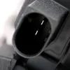 A close-up view of an electrical connector with three pins. Anteprima dell’immagine prodotto