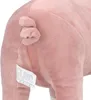 A close-up view of the rear end of a pink plush pig toy, showing its curly tail and a white tag with text and symbols. Podgląd zdjęcia produktu