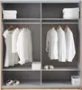 Interior view of a wardrobe with clothes and storage boxes. Produktbild-Vorschau