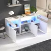 A white sideboard with LED lighting is displayed in a room. Produktbild-Vorschau