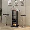 A bar table with two bar stools in a room with a concrete wall. Produktbild-Vorschau
