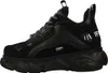 A black Buffalo sneaker with a platform sole, shown from the side against a white background. Produktbild-Vorschau