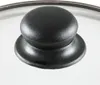 A close-up view of a black knob on a glass lid. Podgląd zdjęcia produktu